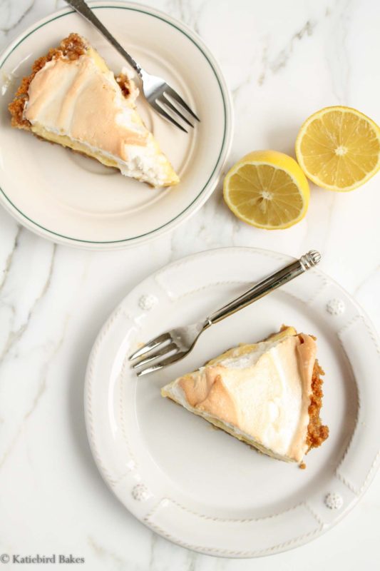 Slices of Lemon Meringue Pie made with sweetened condensed milk and graham cracker crust