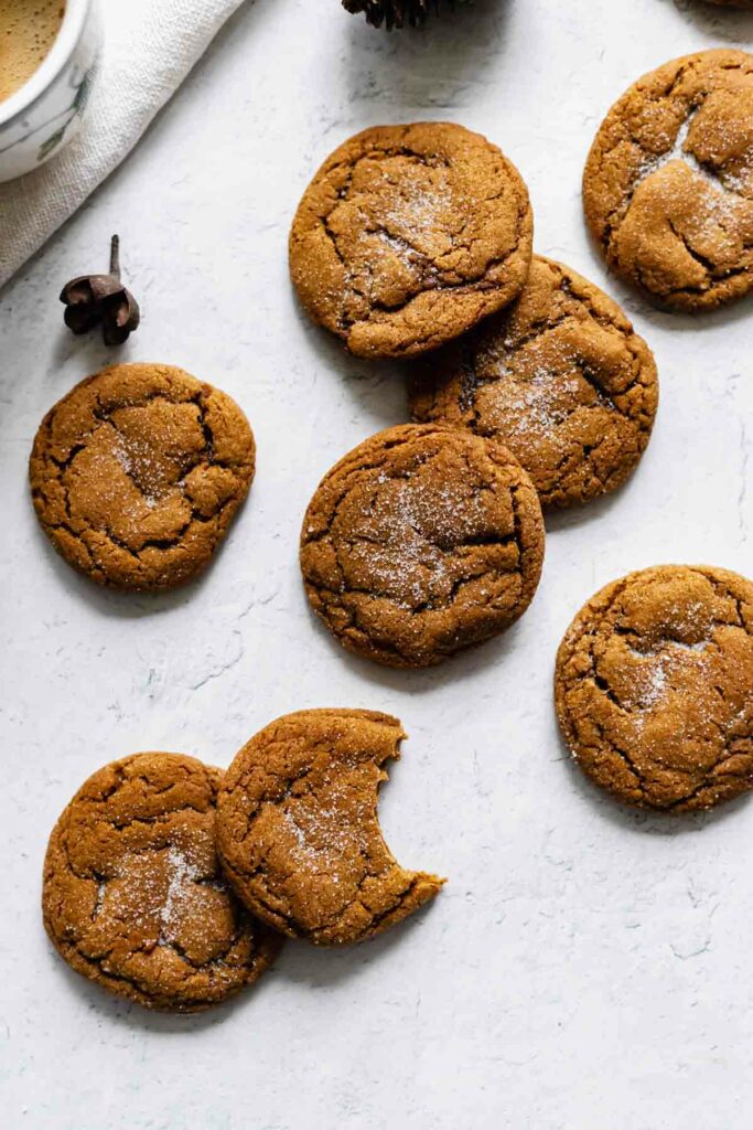 A pile of baked cookies on a white surface