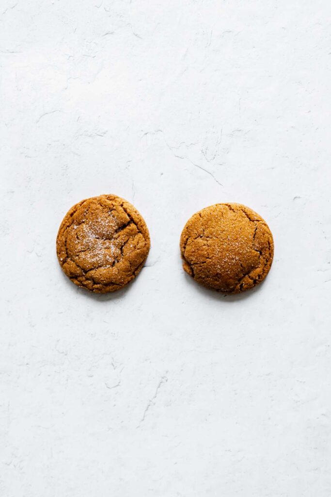 Cookie baked from room temperature dough next to cookie baked from frozen dough