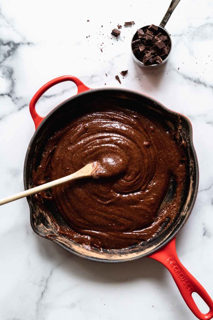 in process - brownie batter being mixed in the skillet