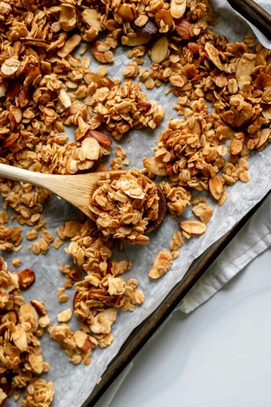 A wooden spoon for serving granola