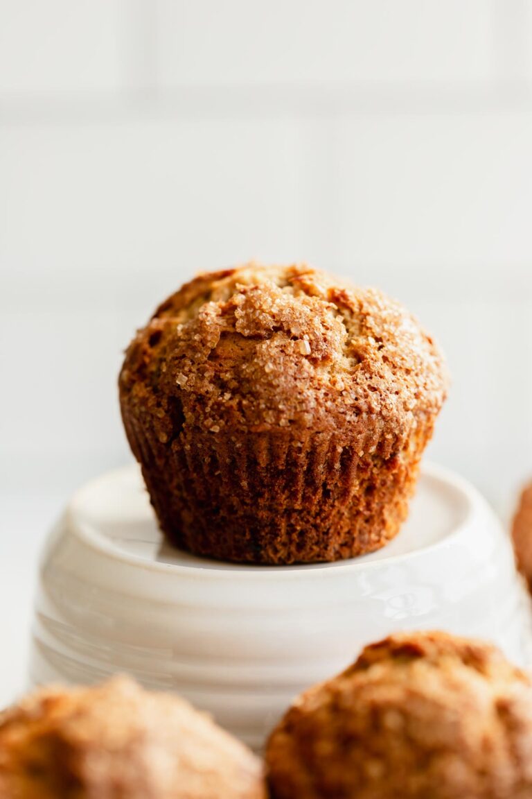 Tall banana muffin on a plate