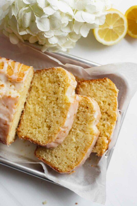 Recipe for one bowl lemon yogurt cake made with olive oil and baked in a loaf pan