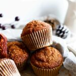 easy spiced molasses gingerbread muffins piled on top of each other