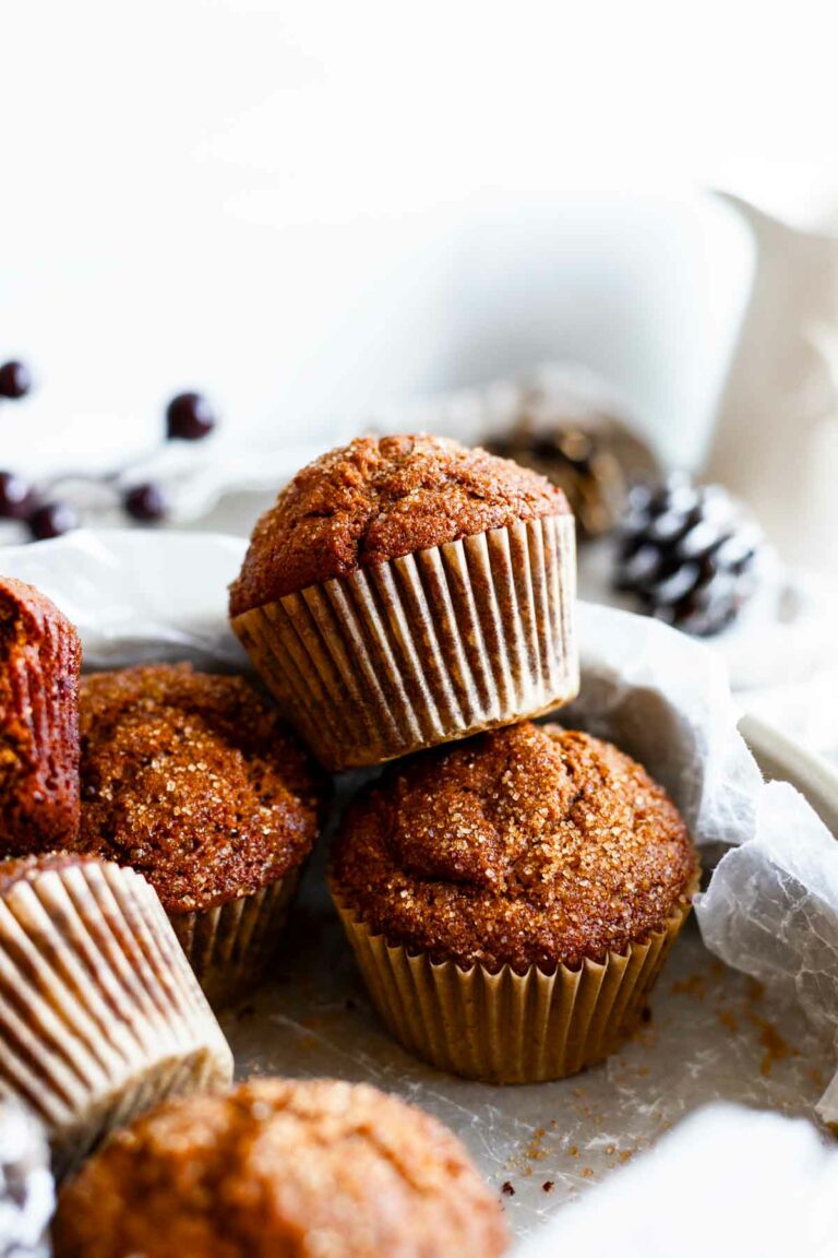 easy spiced molasses gingerbread muffins piled on top of each other