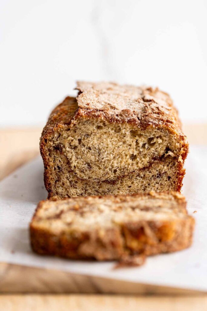 head on view of the finished bread with one slice cut